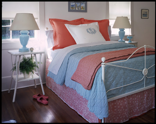 A made bed makes the entire bedroom seem more orderly. A made bed makes the entire bedroom seem more orderly.