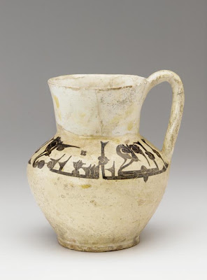 Jug | Origin:  Nishapur,  Iran | Period: ca. 900-1000 | Details:  Not Available | Type: Ceramic Wheel-thrown with applied handle, glazed, and fired | Size: H: 23.2  W: 21.1  cm | Museum Code: S1987.96 | Photograph and description taken from Freer and the Sackler (Smithsonian) Museums.
