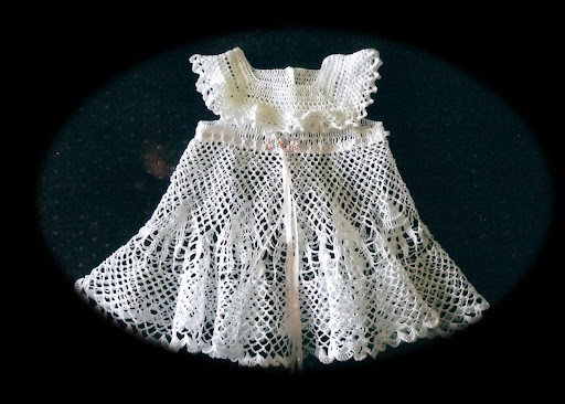 The Christening dress crocheted by Mr. Du Puis without the use of a pattern.