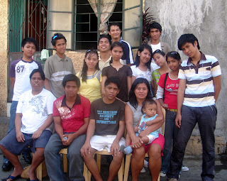 March 7: Raymond Tubera with eldest brother, youngest brother and auntie