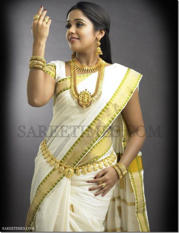 Ananya in beautiful white designer traditional silk saree with gold ...
