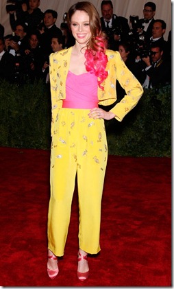 Coco Rocha Teamed A Bright Yellow Studded Suit With Hot Pink Accessories