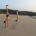 Karl and guest - beach yoga!