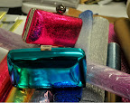 Cool compacts. The pink is from Milly (millyny.com)  and the blue is Roger Vivier (www.rogervivier.com).