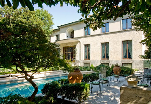 A view of the villa from the garden. A view of the villa from the garden.