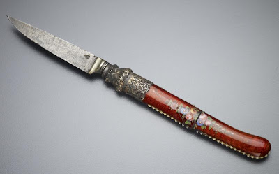 Knife | Origin:  Turkey | Period: 18th-19th century  Ottoman period | Details:  Not Available | Type: Handle: enamelled metal with painted decoration, opalescent glass beads; blade: steel | Size: H: 1.3  W: 15.7   D: 0.9  cm | Museum Code: F1990.22 | Photograph and description taken from Freer and the Sackler (Smithsonian) Museums.