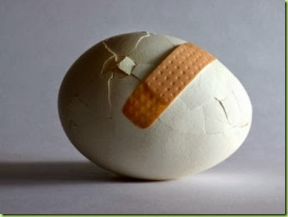 Broken-egg-with-bandaid-300x225