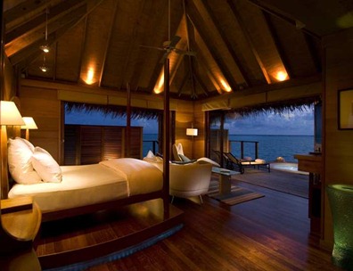 Deluxe Water Villas feature a view over the Indian Ocean.