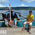 Hubby sitting at the boat dock while waiting for the Scubasurero divers to arrive