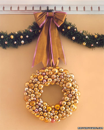 This full-bodied everlasting wreath is crafted from bundles of gold, pink, and silver glass balls on wire stems. This full-bodied everlasting wreath is crafted from bundles of gold, pink, and silver glass balls on wire stems.