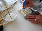 Step 6: Here Wendy is pinching between the middle and top to connect the rows of gum paste.
