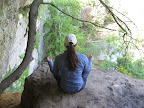 practicing a yoga pose at a break along the trail, at Indian