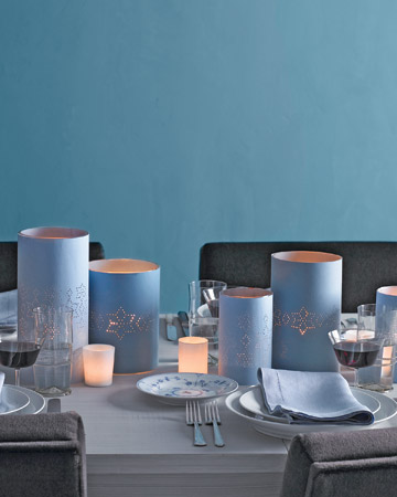 Hurricane vases and votive candle holders can be wrapped in star-punched paper in the color of your choice -- an easy way to suffuse your party with warmth. Hurricane vases and votive candle holders can be wrapped in star-punched paper in the color of your choice -- an easy way to suffuse your party with warmth.