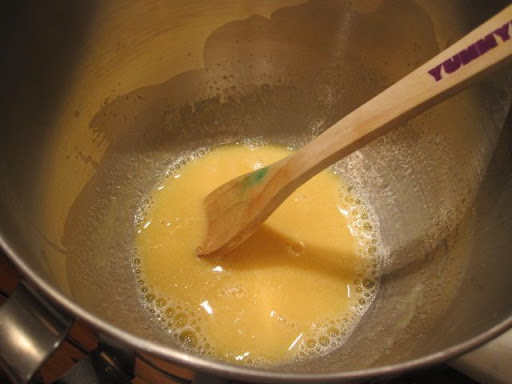 Heating the whole eggs and sugar in (not over) a pan of simmering water until they reach 160F (which happened faster than I expected!). Heating the whole eggs and sugar in (not over) a pan of simmering water until they reach 160F (which happened faster than I expected!).