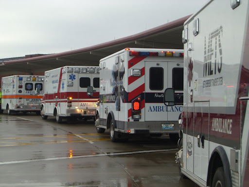 Ambulances from local hospitals and agencies line up to drop off the mock patients in the simulation. (Photo credit: Jennifer Moore)