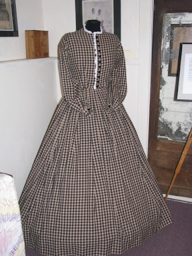 This is a replica of a dress worn by Father Moses Berry's great-great grandmother.
