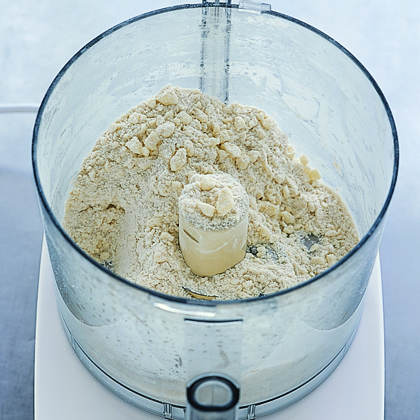 Pulse until mixture resembles coarse meal, with a few pea-size pieces of butter remaining. Those butter pieces are key to a flaky dough, so don't over process. Pulse until mixture resembles coarse meal, with a few pea-size pieces of butter remaining. Those butter pieces are key to a flaky dough, so don't over process.