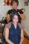 Mary doing Gina's hair.
