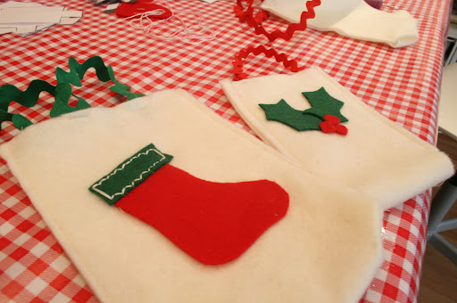 We also made small felt bags which required some sewing. The kids were able to decorate them with pieces of felt, templates, and markers. You can get the basic instructions here: http://www.marthastewart.com/271031/holiday-rickrack-crafts