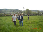 Walking from the nursery to a new forest. Senor Alfonso (at left) planted the trees with the help of a friend. Senor Alfonso has lived in the area for over 60 years. The field we were walkin through used to be a landing strip for airplanes. Before there were roads, in the 1950's, loggers used to transport precious wood by plane. Lake Pomacochas, Peru.