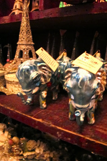 Regal blue elephants next to a mini-Eiffel Tower. Et voila!