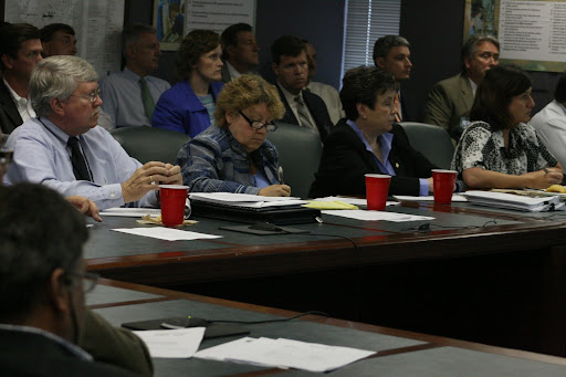 City Council members listen in and take notes of City Utilities opening presentation. (photo credit: James Mulvenon)