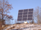 2.4 kilowatts of Sharp modules mounted on a dual axis tracker for an off grid home, installed north of Verona in 2006.