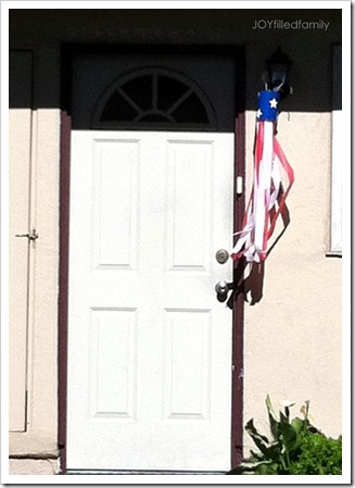 God Bless America windsock at rectory