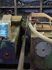 This machine polishes the rough rods to precise diameter.
