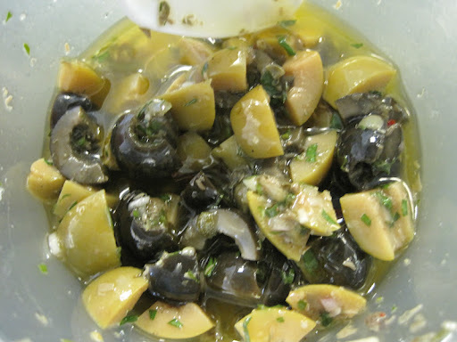 Olive and caper tapenade enjoyed with the burrata