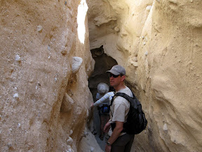 Mark and crew negotiate through the narrowing slot canyon.