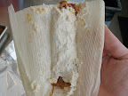 Repeat with the other side so the filling is encased in a cylinder of dough