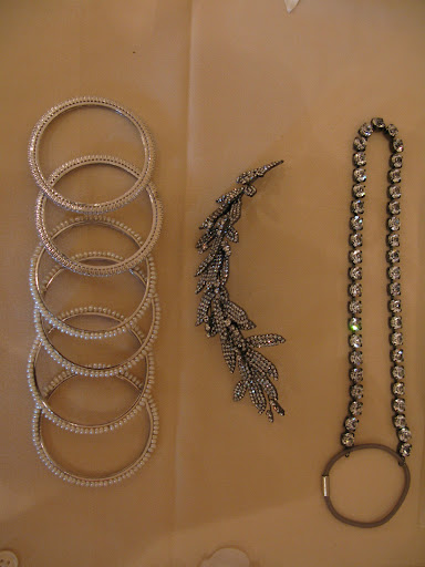 Some rhinestone and pearl bangles from Tejani and some sparkly hair accessories from Jennifer Behr. Easy to travel with to any destination!