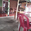 An average restaurant in San Pedro - actually most of them have some form of floor covering, I think it this place it was out being washed (or something less insane).