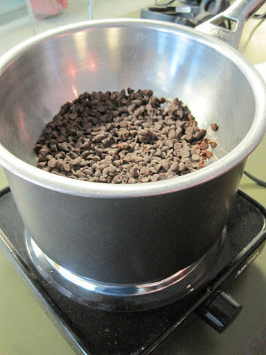 The chips are being melted in a home made double boiler.