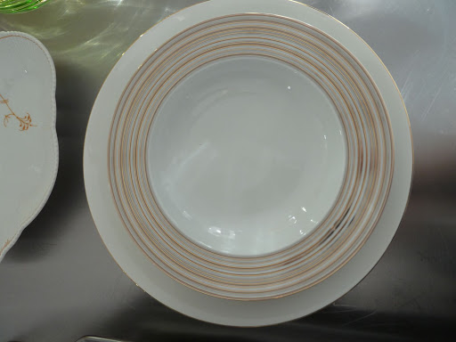 Two patterns of Mikasa dinnerware: 