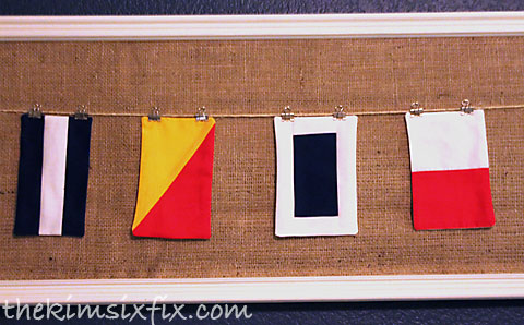 Nautical flags hung on line