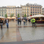 129-Poland-Krakow- Rynek Glowny-Shops in town square.JPG