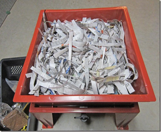 Bedding covered with shredded newspaper