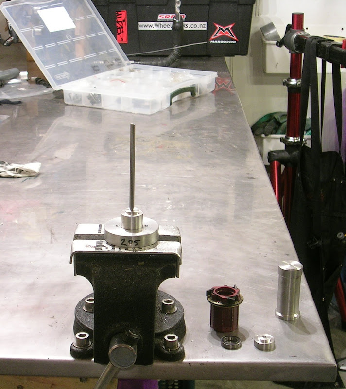 The lower bearing adapter on the base