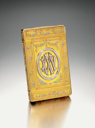 A Neoclassical cigarette case by Faberge, richly decorated with flowers and swags in four colors of gold. It was a gift from the Empress Alexandra to Grand Duchess Maria Pavlovna and Grand Duke Vladimir on their silver wedding in 1899. A Neoclassical cigarette case by Faberge, richly decorated with flowers and swags in four colors of gold. It was a gift from the Empress Alexandra to Grand Duchess Maria Pavlovna and Grand Duke Vladimir on their silver wedding in 1899.