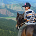 Kazakh boys over Miao'er Gou, Xinjiang