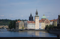 One end of the Charles Bridge - the Klementium (national library), Smetana Museum, and the St. Francis of Assisi chruch