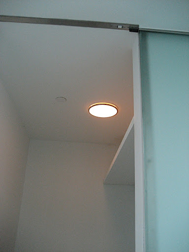 The closet lighting is so minimal.  I'm sure once it's filled with clothes, it would be difficult to see in here.