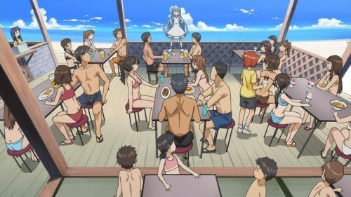 Wide shot of a beach cafe full of swimsuited patrons all looking at the squid girl standing akimbo on one of the tables lording over them
