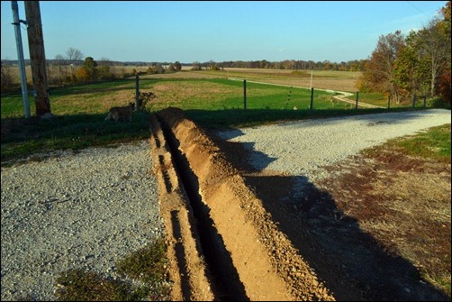 trench across the driveway