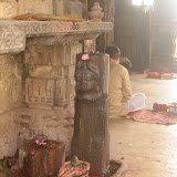 This ekmukhi linga is standing without pitha (pedestal). It is not clear whether this lingam was installed in later period as the position is little awkward. This ekmukhi lingam is facing north, so this face should represent the Vamadeva aspect of Shiva.