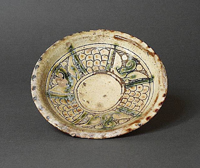 Dish Afghanistan Dish, 9th-10th century Ceramic; Vessel, Earthenware, with incised slip and color under transparent glaze, Height: 1 3/8 in. (3.49 cm); Diameter: 6 5/16 in. (16.03 cm) Gift of Andrew Hale and Kate Fitz Gibbon (AC1992.213.4) Art of the Middle East: Islamic Department.