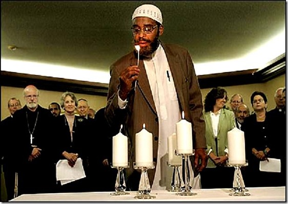 CV -- Brookline, MA., 09/11/06, Interreligious leader and representatives in Massachusetts gathered together at the Greek diocesan headquarters to mark the fifth anniversary of 9/11. Prayers were said and candles were lit in remembrance. Imam Abdullah Faaruuq, cq, representing the Islamic Council of New England lit a candle. Section: Metro, Reporter: Paulsen. Suzanne Kreiter/Globe staff. CV -- Brookline, MA., 09/11/06, Interreligious leader and representatives in Massachusetts gathered together at the Greek diocesan headquarters to mark the fifth anniversary of 9/11. Prayers were said and candles were lit in remembrance. Imam Abdullah Faaruuq, cq, representing the Islamic Council of New England lit a candle. Section: Metro, Reporter: Paulsen. Suzanne Kreiter/Globe staff.