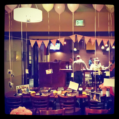 hanging photos by Cordier Events birthday decorations